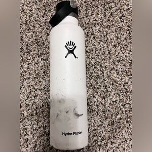 White 24 oz hydro flask with supreme sticker